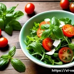 허브로 만든 유럽식 간편 요리 - A vibrant summer salad bowl featuring fresh basil, parsley, and mint leaves mixed with crisp lettuce...